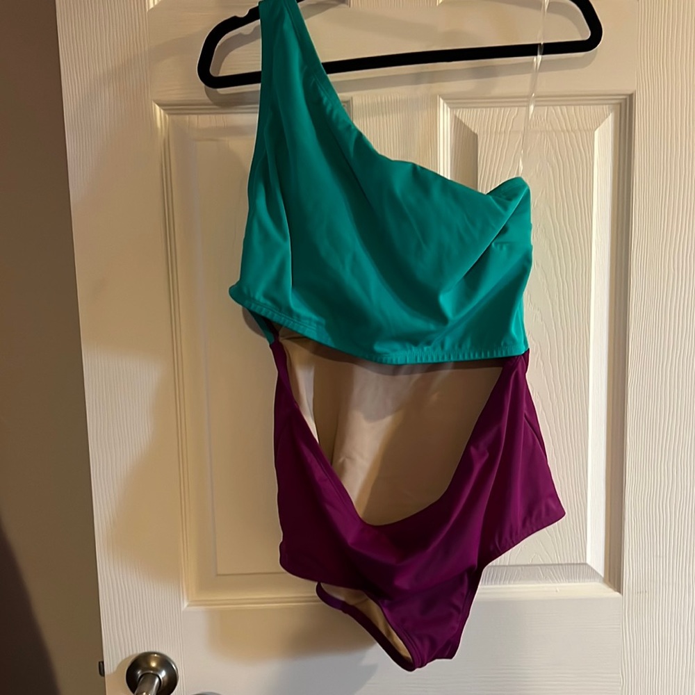 Never worn cut out one piece swim swimsuit size 16